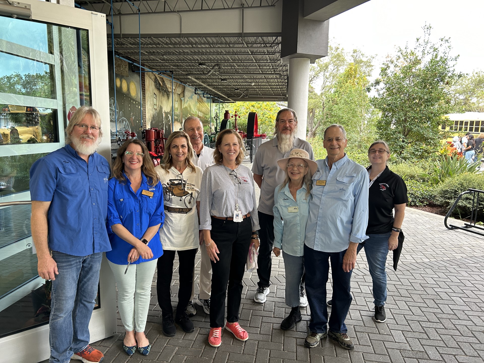 A group of people posing for a photoDescription automatically generated